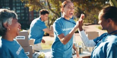 Diverse professionals collaborating over sustainability blueprints